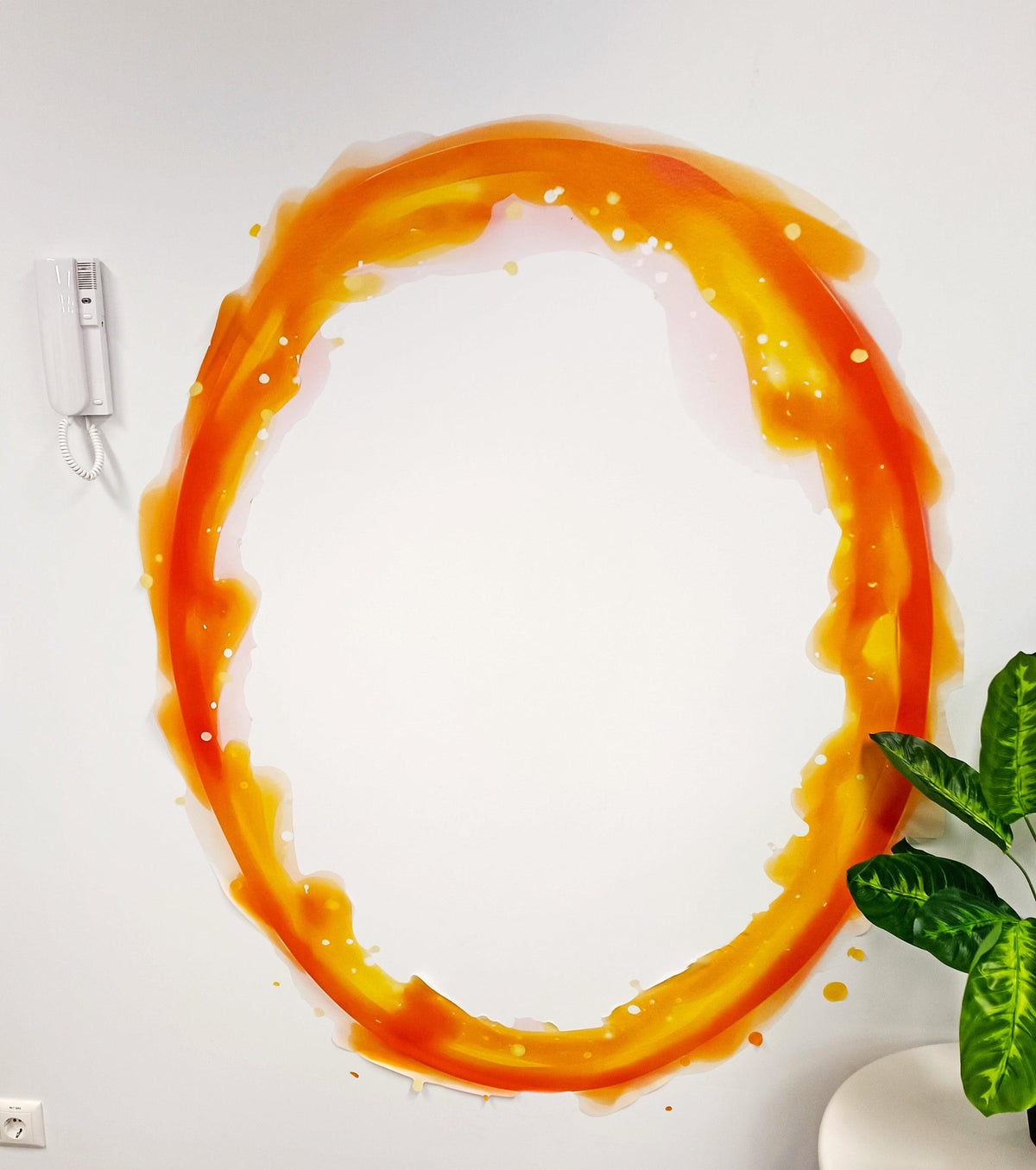 Orange portal aura wall sticker on a white wall.