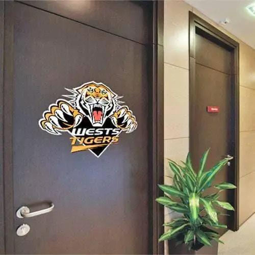 Custom tiger emblem vinyl decal displayed on an office door.