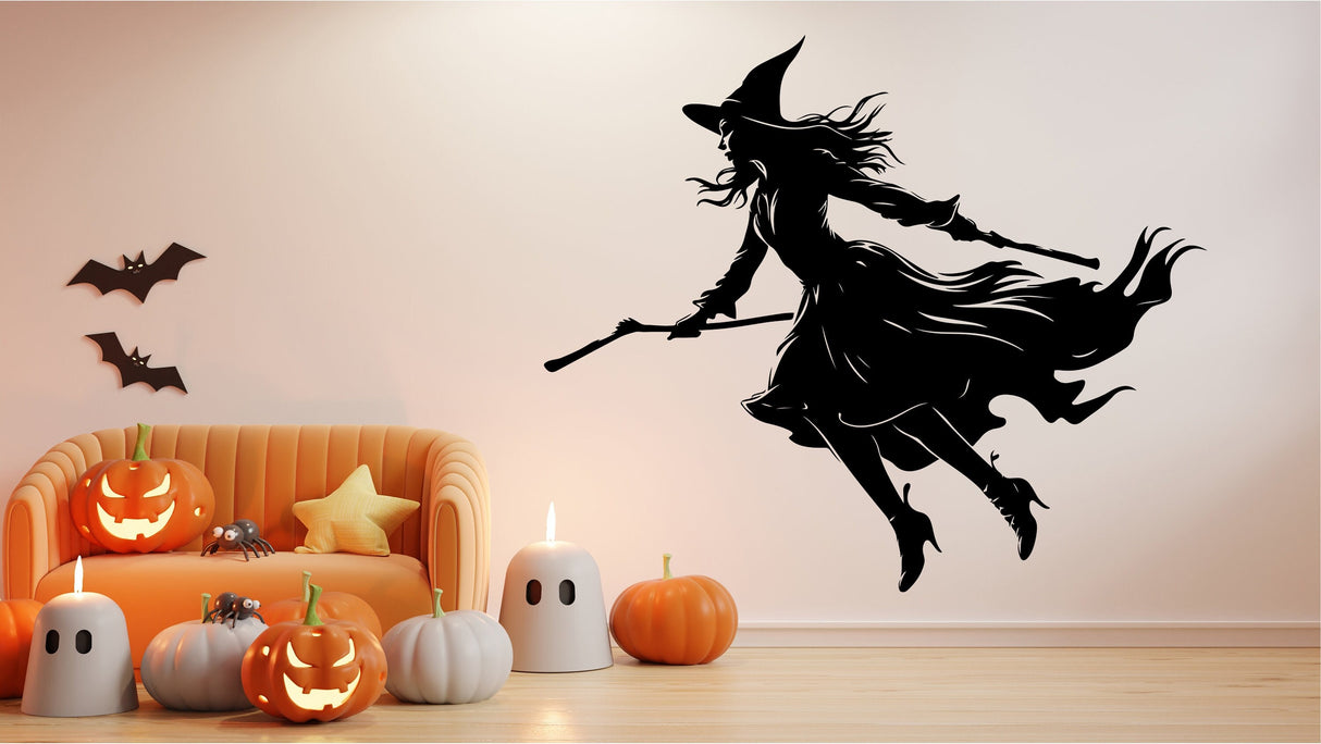 Flying witch on a broom silhouette wall decal.