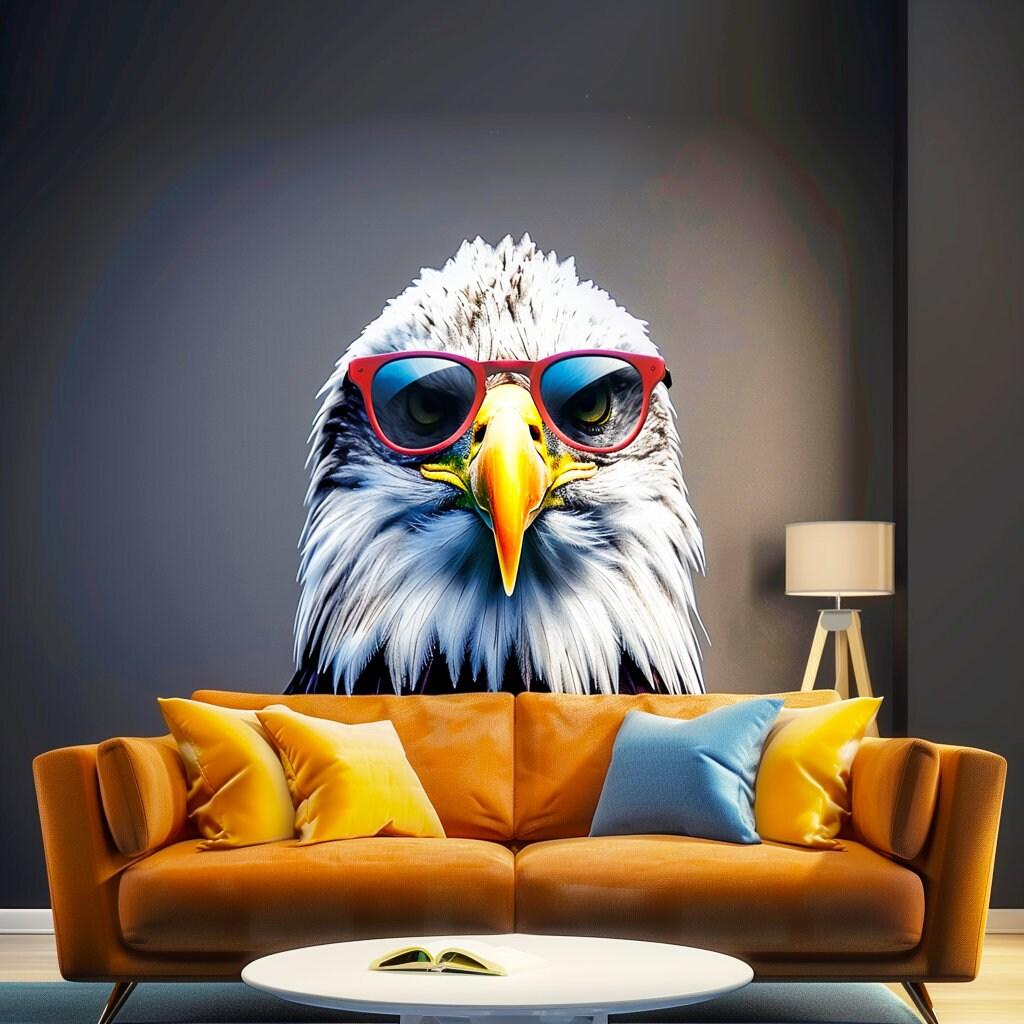 Wise bald eagle wearing red glasses wall decal above a stylish sofa, adding whimsy to home decor.