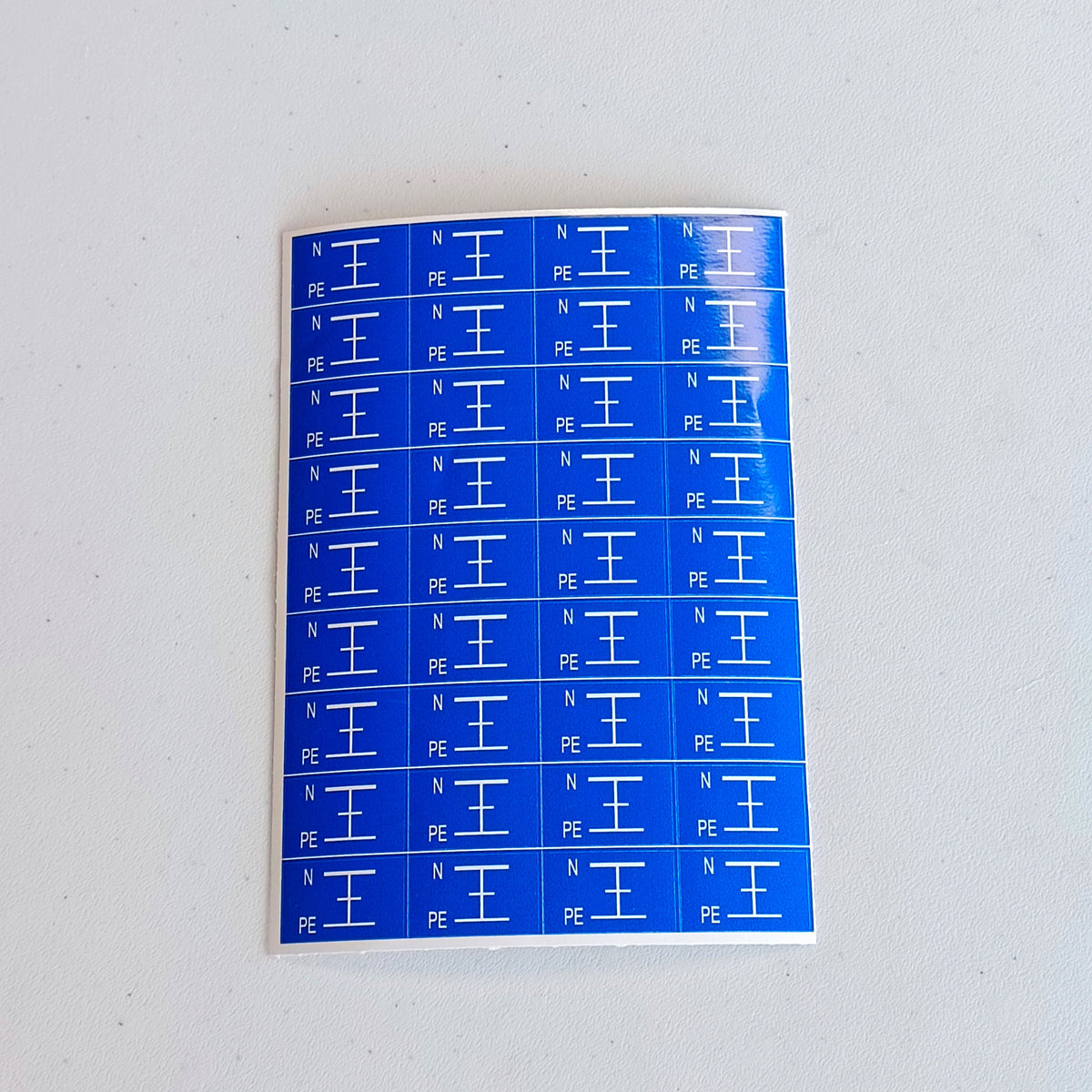 Additional product view of Blue Grounding Symbol Stickers.