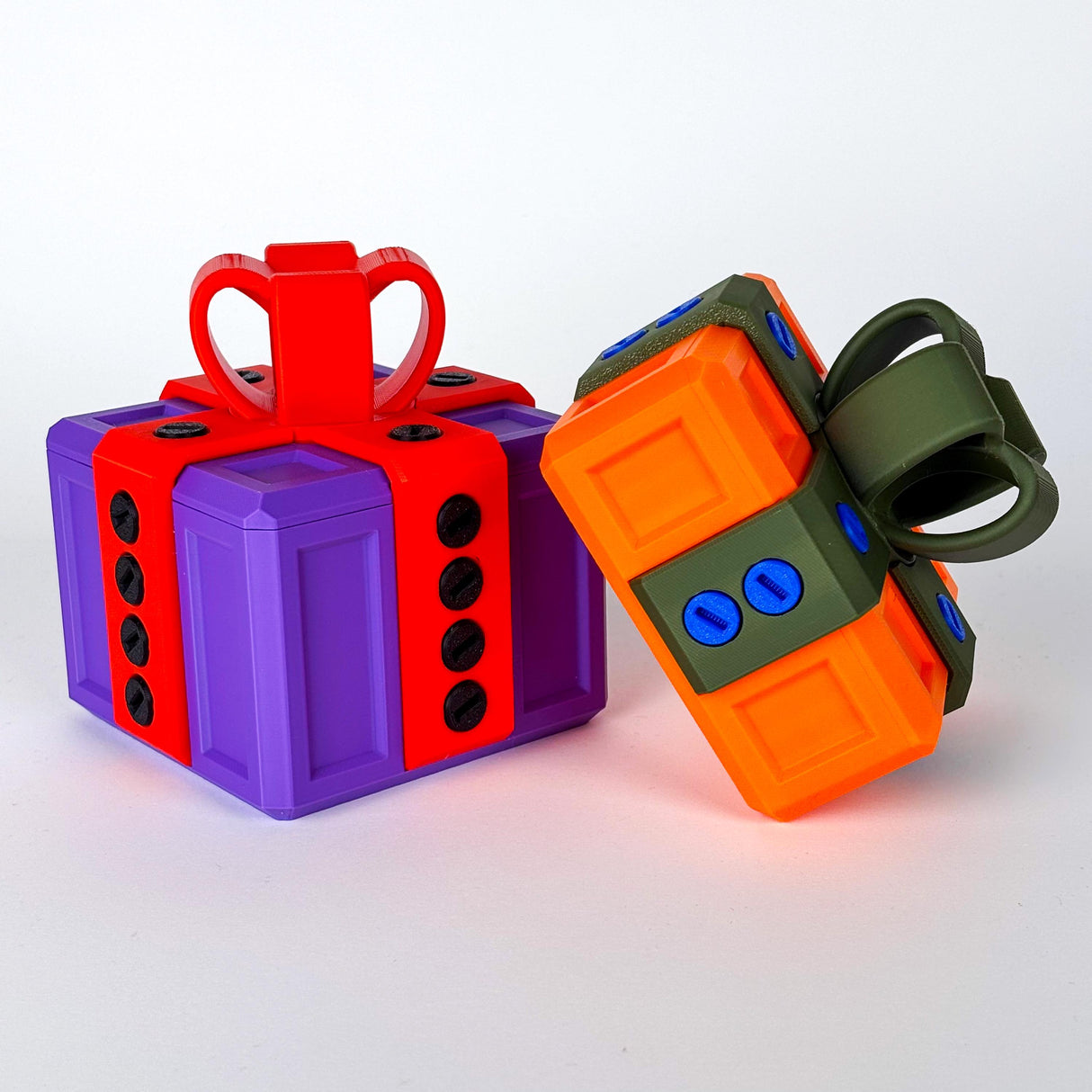 Colorful 3D printed annoying gift boxes designed for fun challenges and gag gifts.