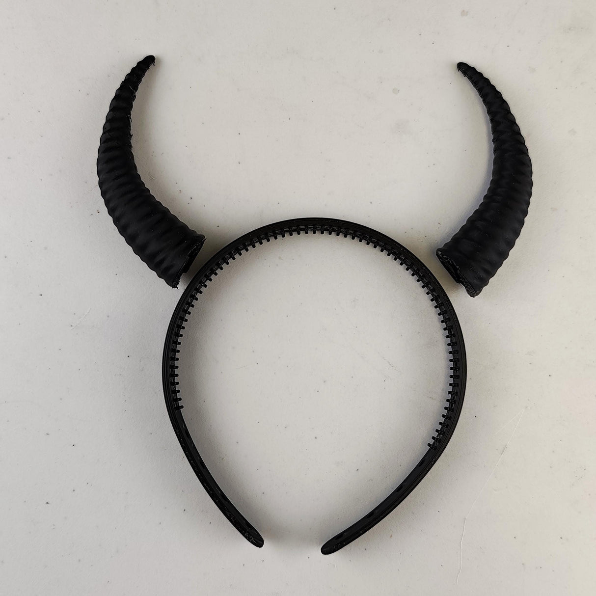Product presentation view of Subtle 3D Printed Demon Horns.