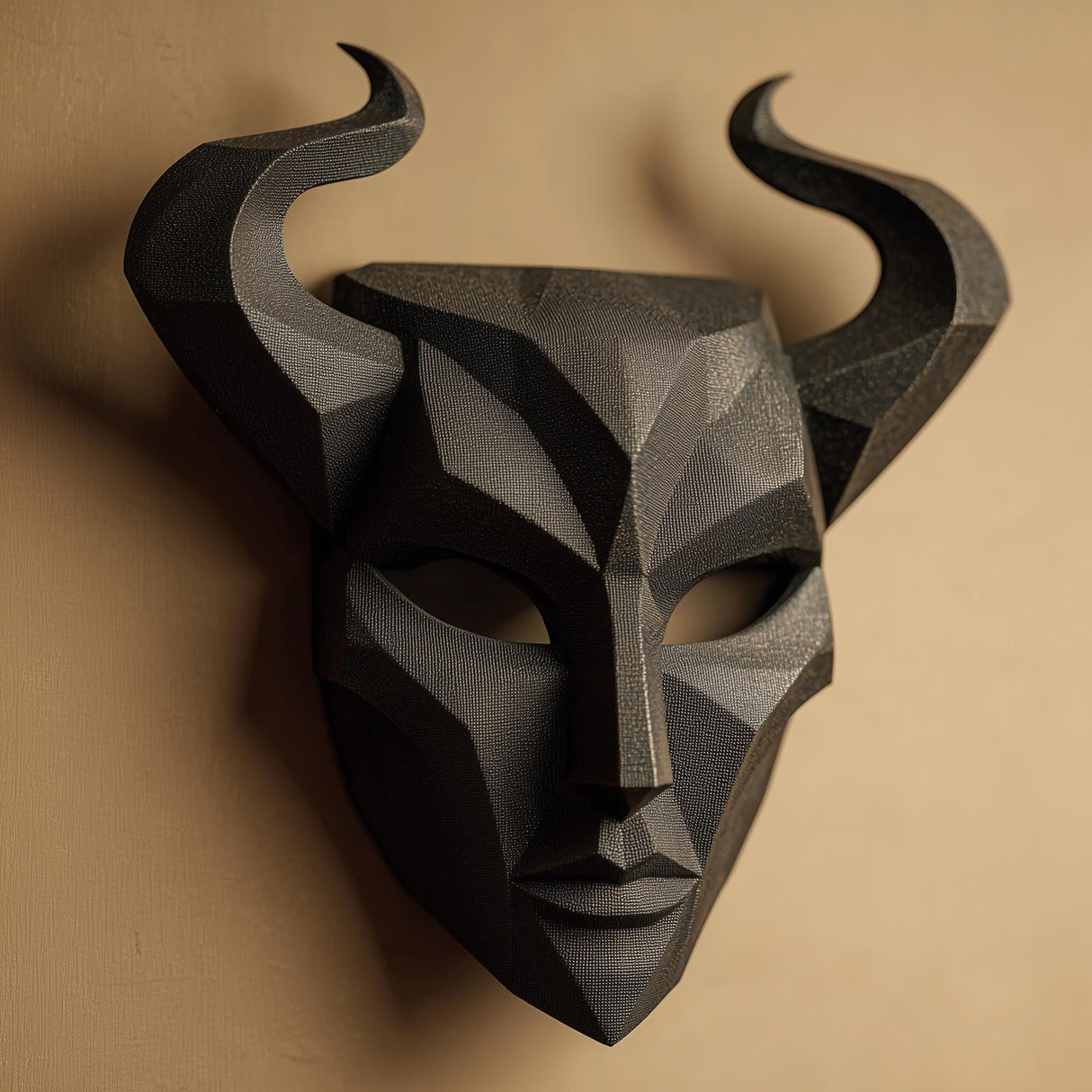 3D printed horned mask wall sculpture with angular face and long curved horns