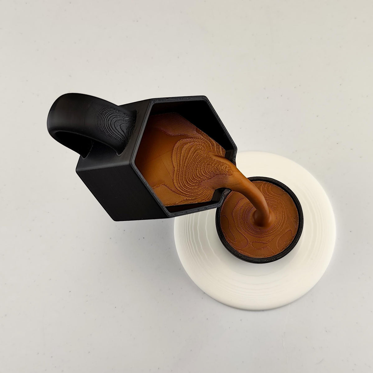 Product presentation view of Floating Coffee Pour Sculpture.