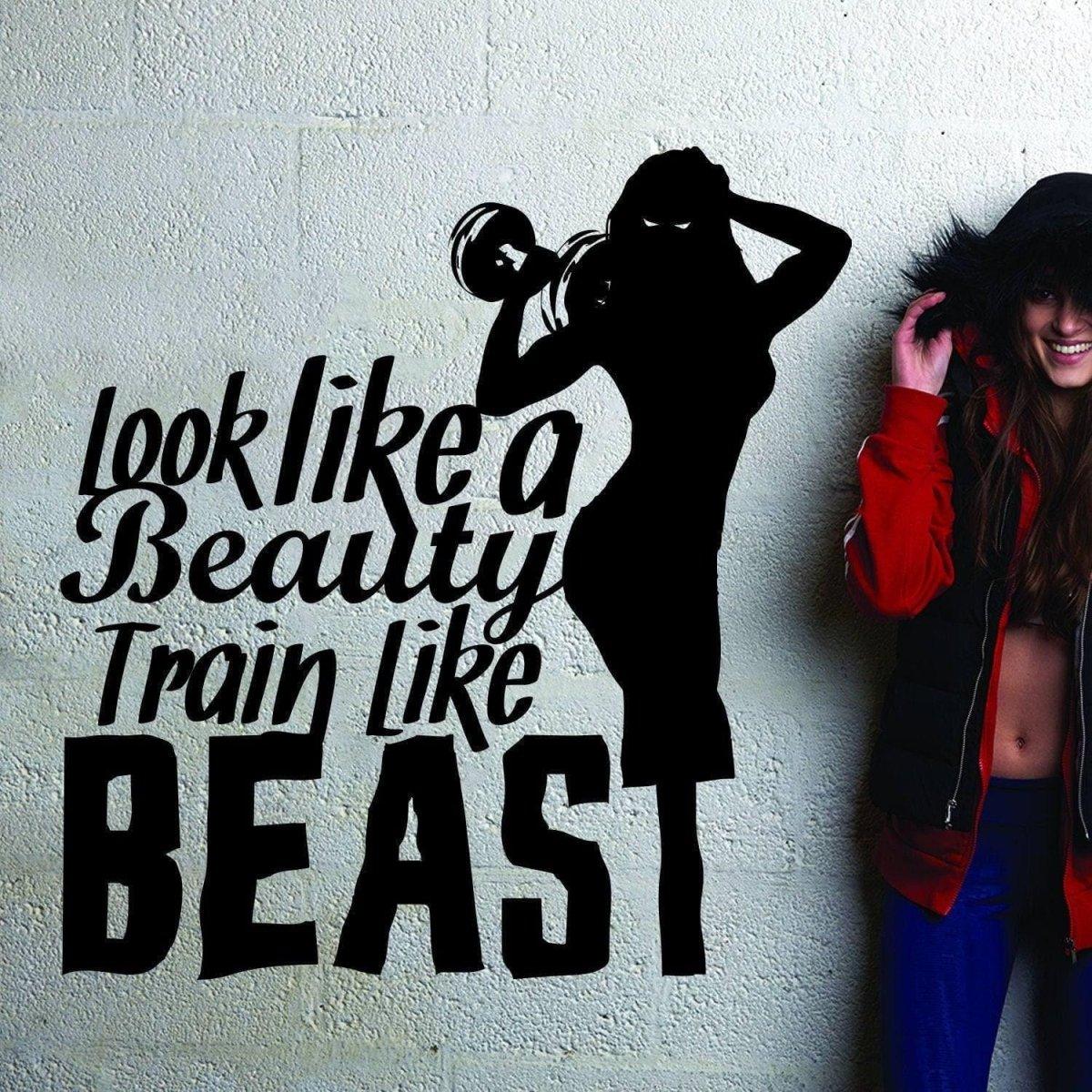 Motivational fitness wall sticker with the quote “Look like a beauty, train like a beast.”