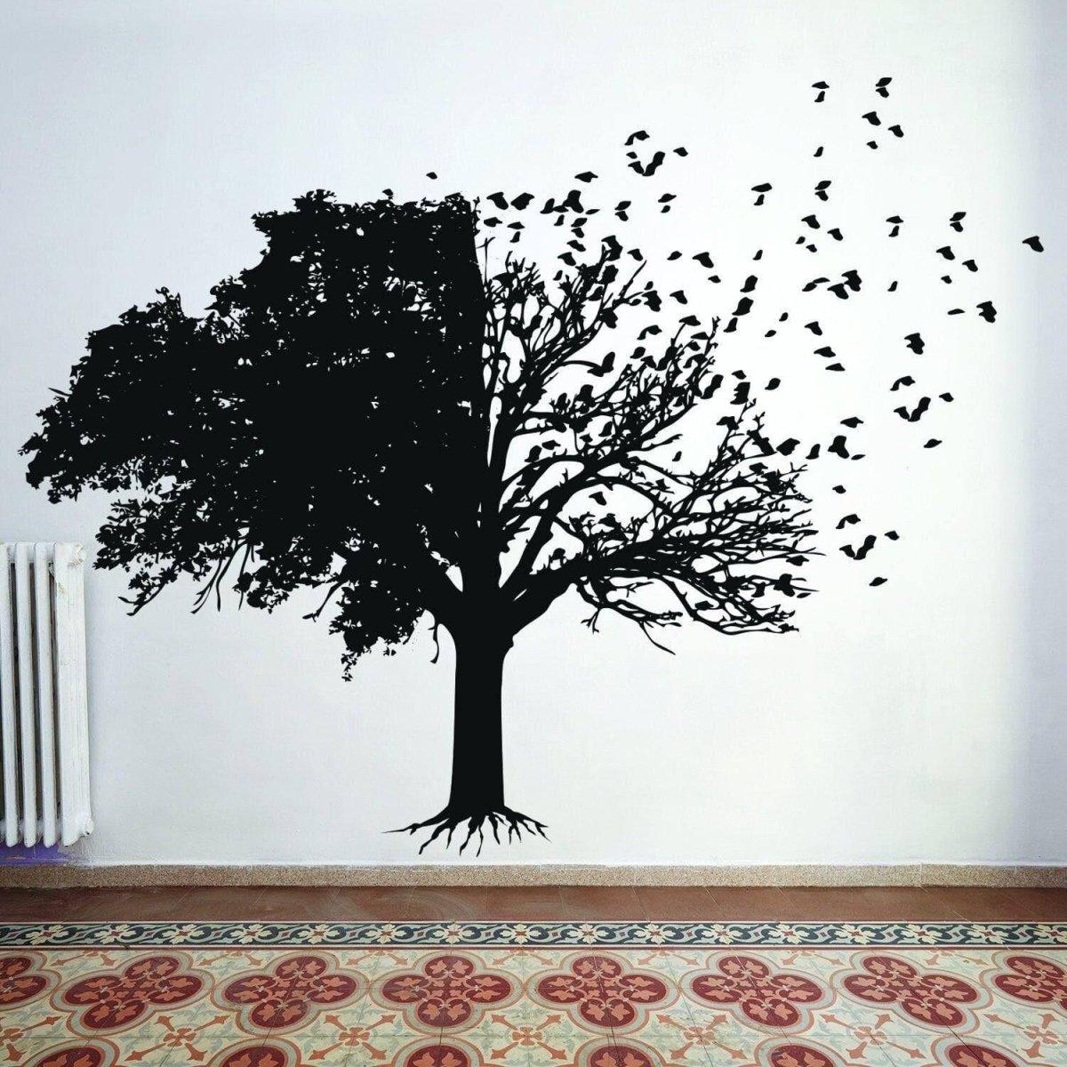 Chic tree wall sticker in black silhouette design with birds and branches.