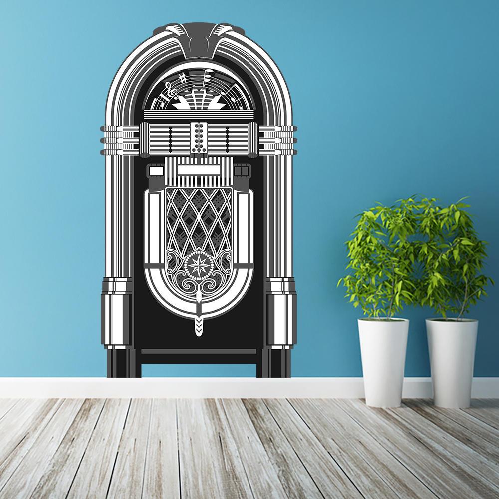 Vintage jukebox wall decal on blue wall, adding a nostalgic music vibe to the room decor.