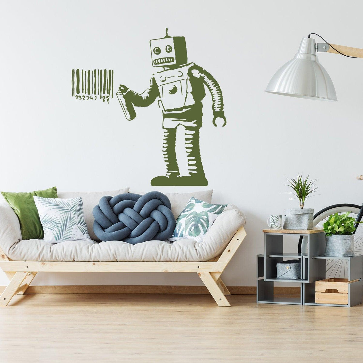 Barcode robot wall sticker displayed above a modern sofa.