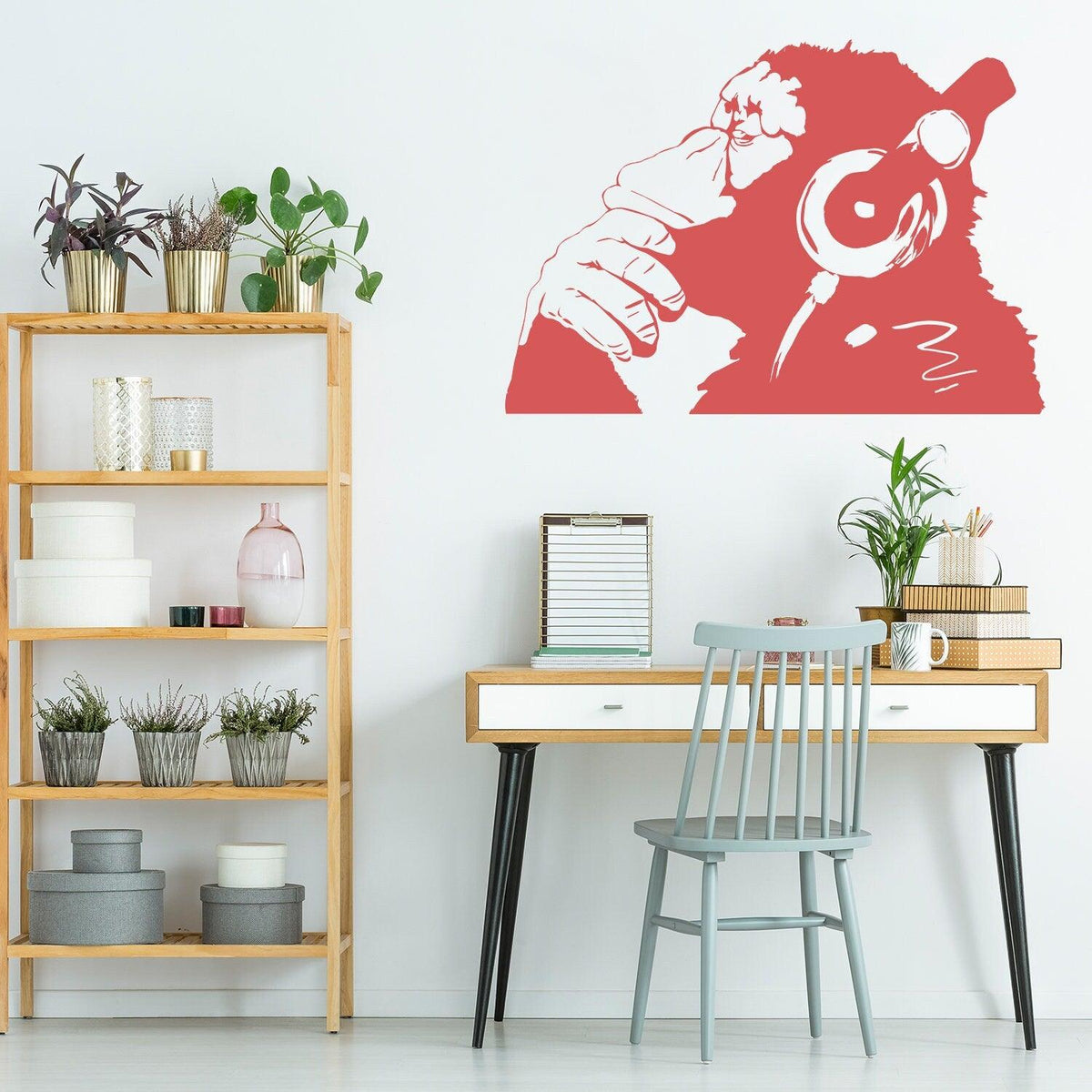 Thinking monkey wall sticker in red in a modern room.
