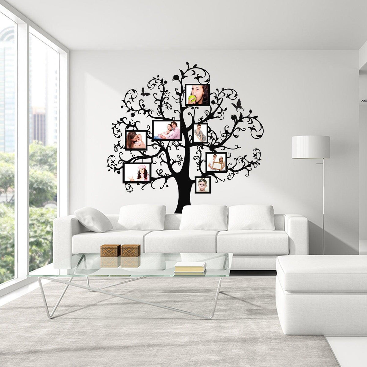 Vinyl wall decal of a tree displaying family photos in frames.
