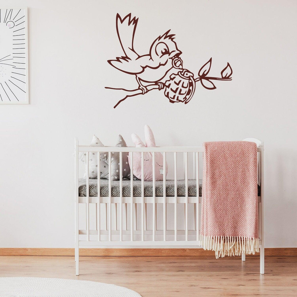 Bird with grenade street art wall decal displayed in a nursery.