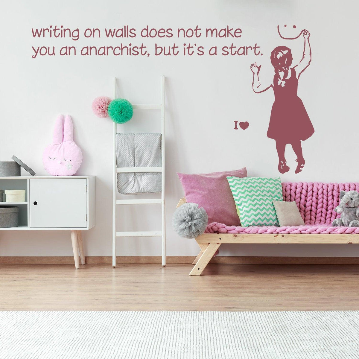 Girl anarchist wall sticker with quote in a stylish interior.