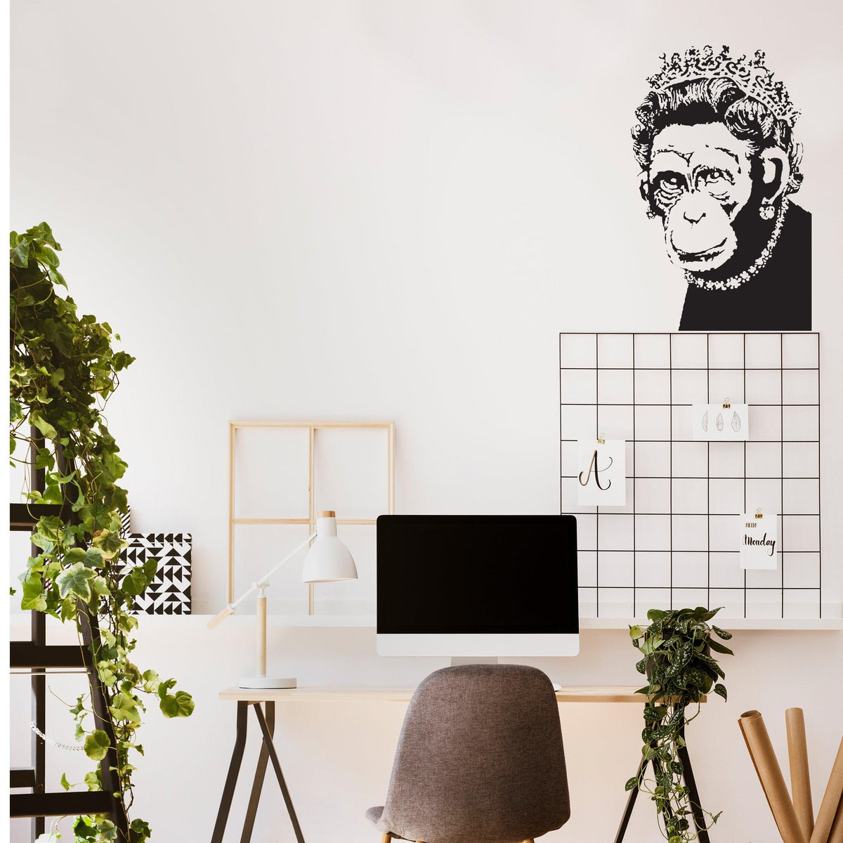 Monkey queen wall sticker displayed in a modern kitchen workspace.