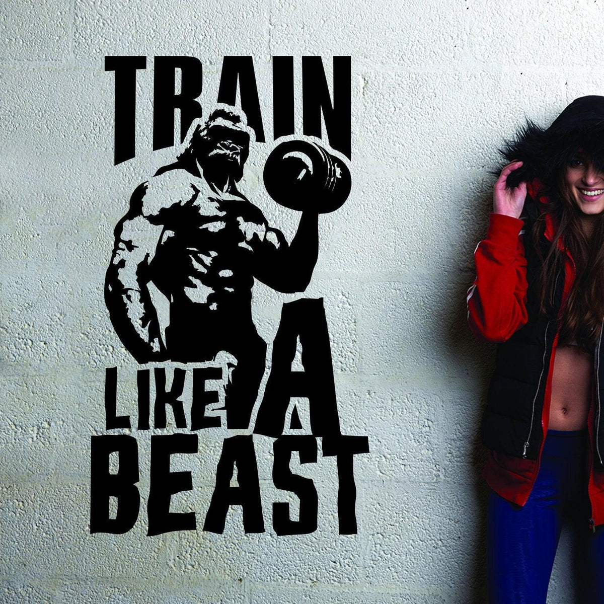Vinyl decal featuring the quote 'Train Like A Beast' with a muscular figure.