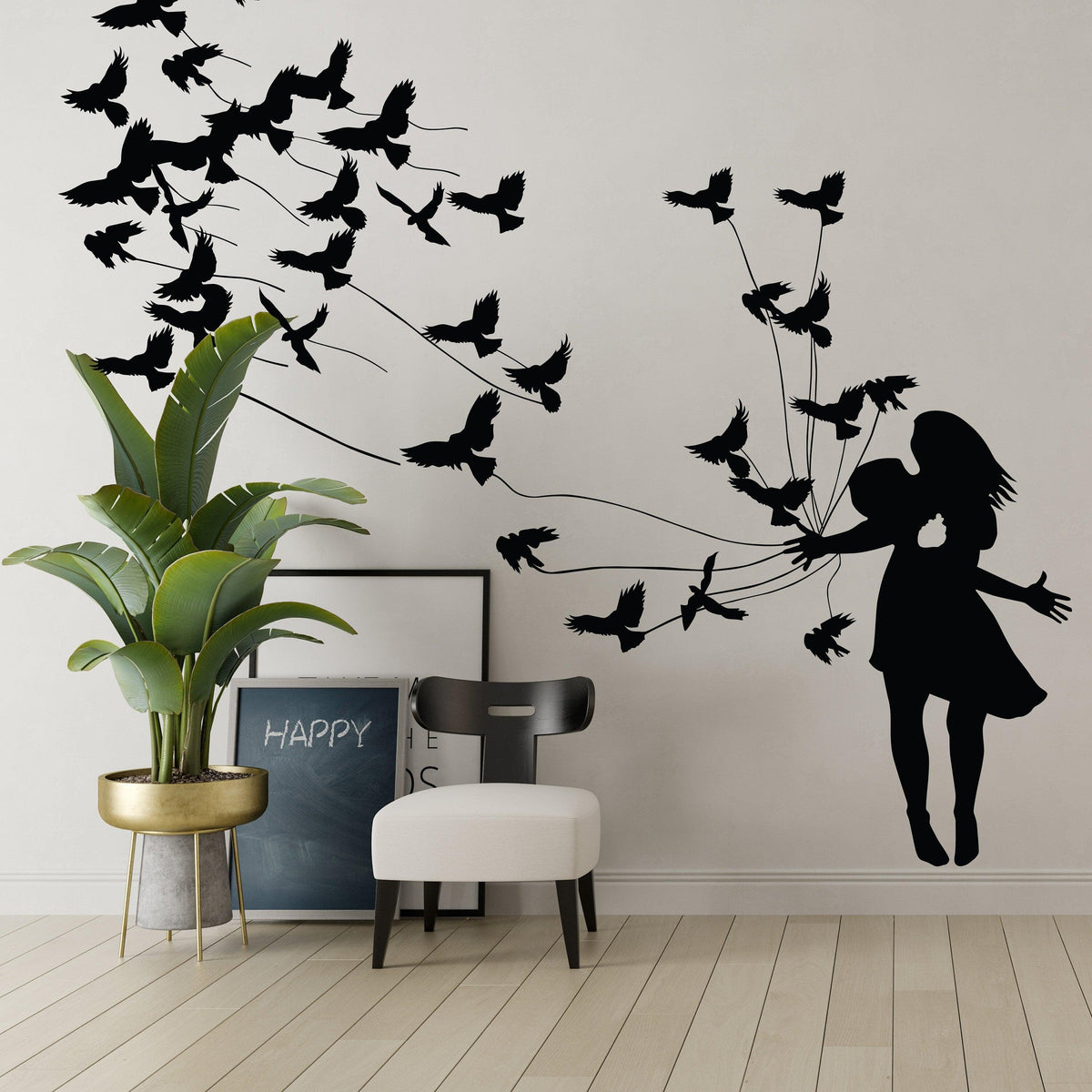 Kissing wall decal featuring silhouettes of a couple and birds.