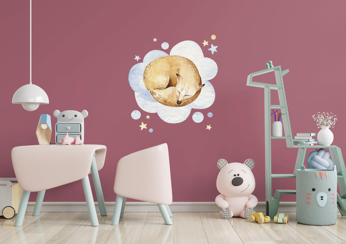 Baby nursery wall sticker featuring a sleeping fox in clouds.