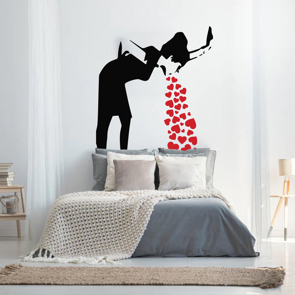 Love Sick Girl wall decal with red hearts displayed in a modern bedroom.