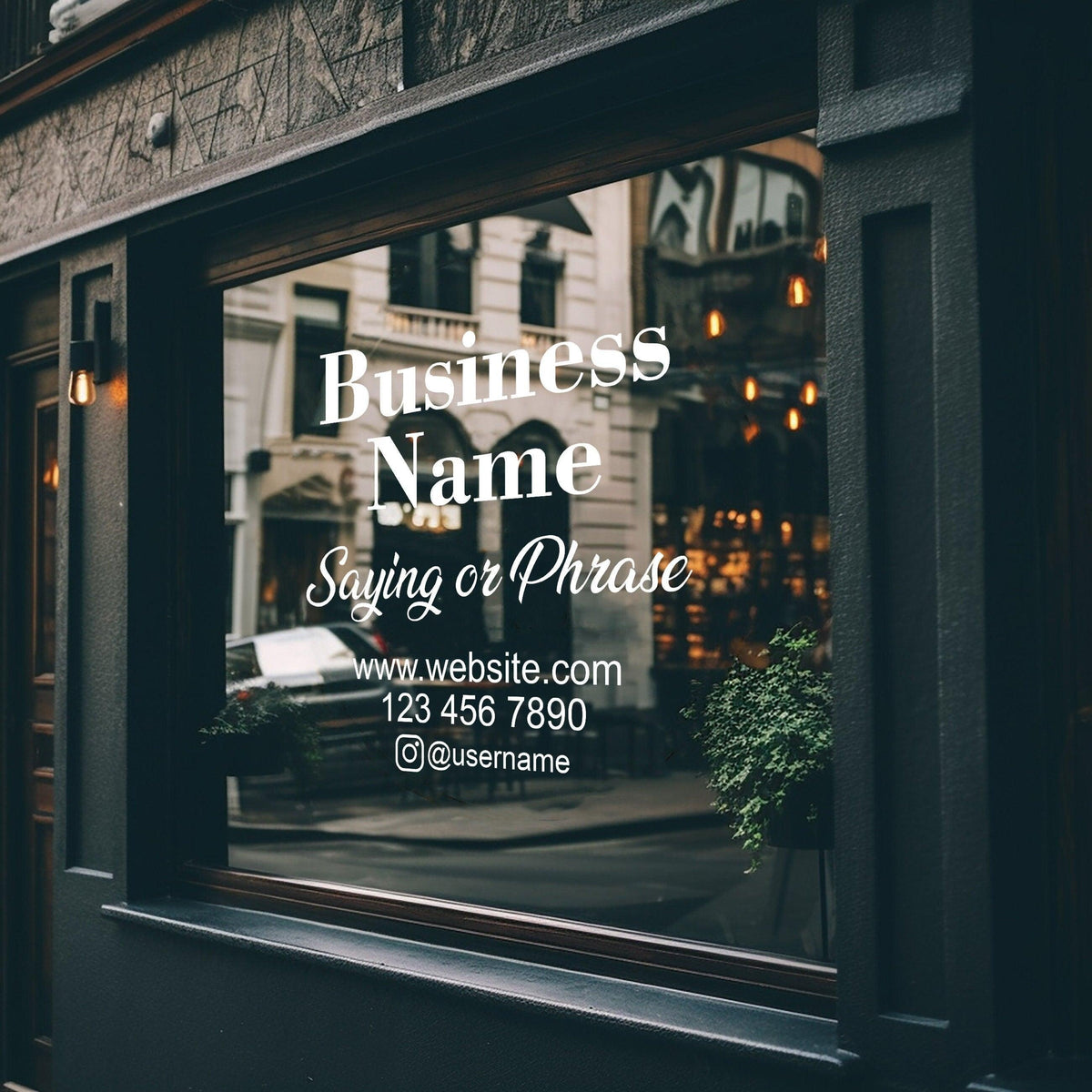 Custom window decal featuring business name and contact information on a storefront.