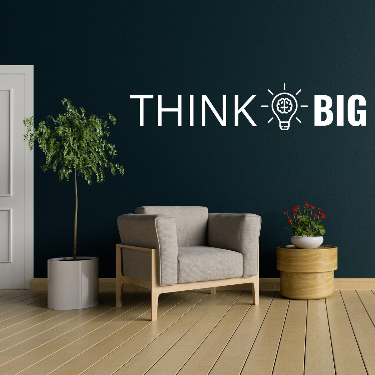 Настенная наклейка THINK BIG над креслом в современном офисе.