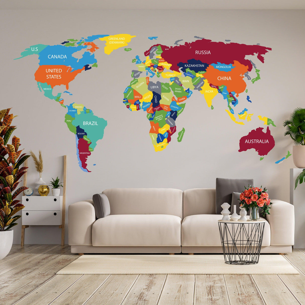 Colorful world map vinyl wall sticker decal showcasing countries in a modern living room setting.