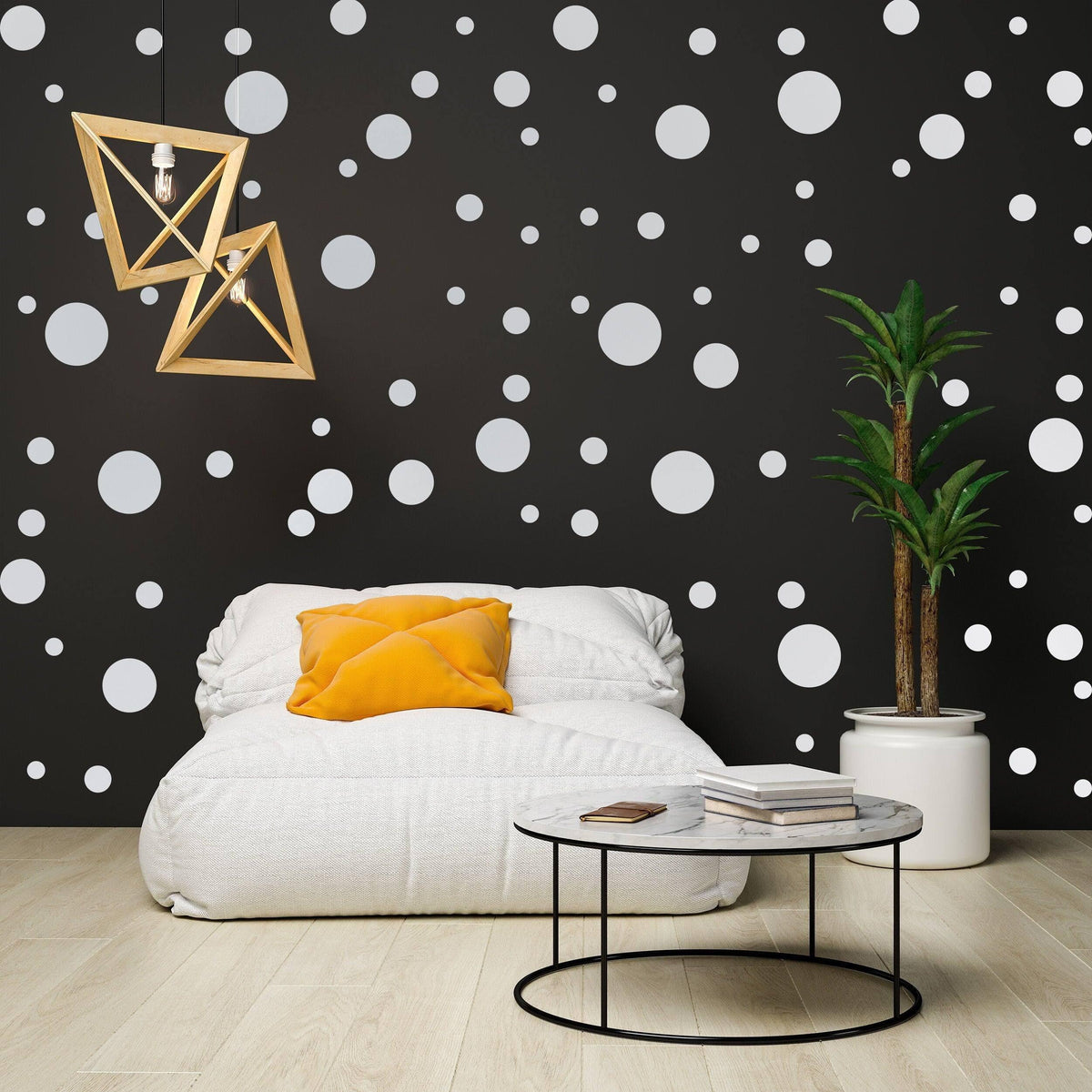 Cozy living space featuring white round dot stickers on a black wall, a comfortable chair, and modern decor.