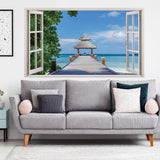 3D window wall sticker creating a beach view, enhancing living room decor with ocean vibes.