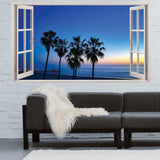 3D beach view wall sticker with open windows showing palm trees and ocean at sunset.