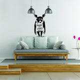 Monkey graffiti wall sticker with Keep It Real text displayed on a modern wall.