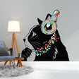 Whimsical cat wall decal with headphones and colorful necklace.