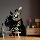 Whimsical cat wall decal with colorful design in stylish room setting.