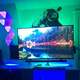 Cool thinking monkey wall sticker above a TV, vibrant colors and modern decor creating a lively atmosphere.