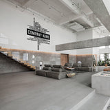 Modern office interior showcasing a custom business name vinyl wall decal in a stylish design.