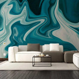 Elegant marble self-adhesive wallpaper in a stylish living room with a modern white sofa and a coffee table.