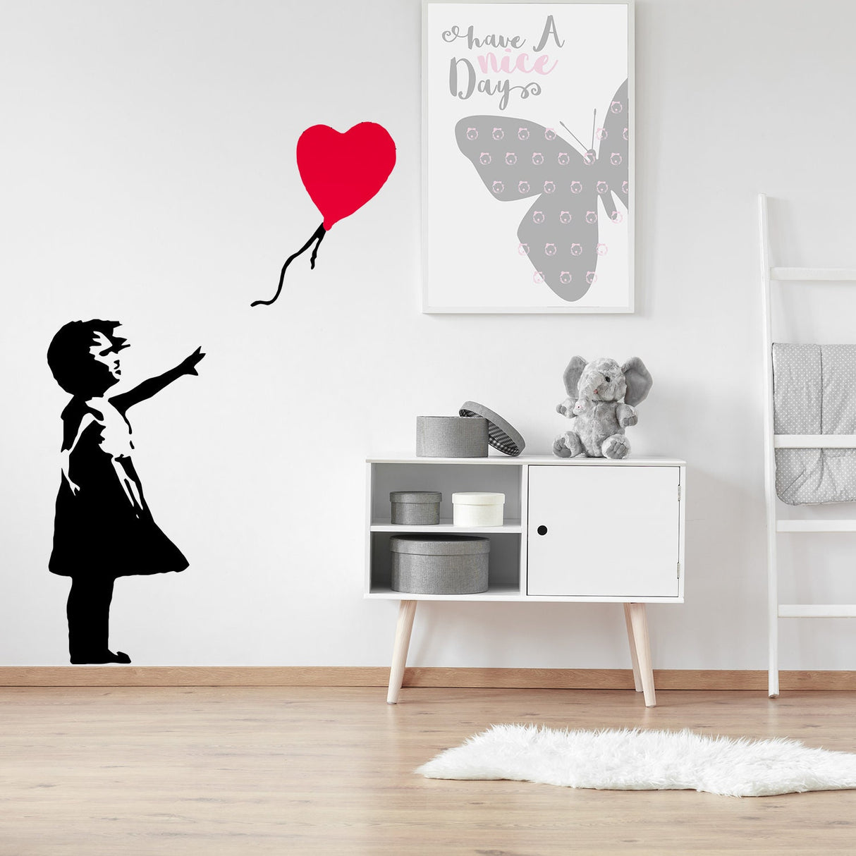 Girl with heart balloon street art vinyl wall sticker.