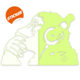 Glow-in-the-dark monkey with headphones vinyl wall decal shown in a room setting.