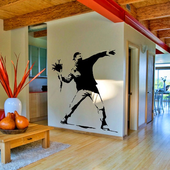 Product presentation view of Artist Flower Thrower Wall Decal.