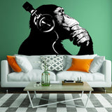 Thinking monkey with headphones vinyl wall decal.