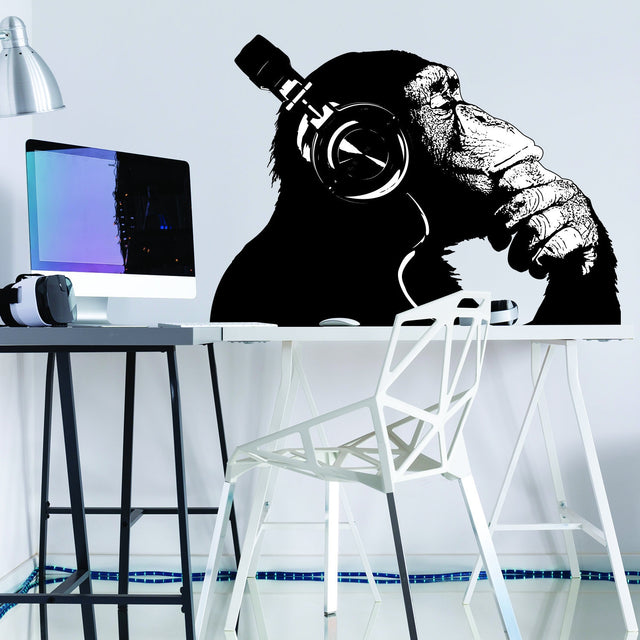 Thinking monkey with headphones wall sticker.