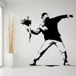 Flower thrower street art vinyl wall decal.