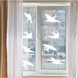 25x Window Decal Bird Strike Glass Anti Collision Cling Sticker applied to a window.