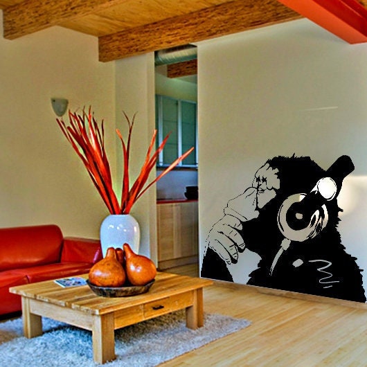 Thinking monkey with headphones vinyl wall decal.