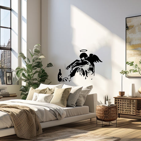 Fallen angel street art wall sticker with wings and halo.