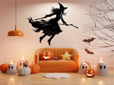 Flying witch decal for a door or garage display.