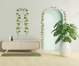 Hanging vine wall sticker displayed as living room wall art.