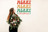 Merry Merry Merry Christmas wall decal shown in a room setting.