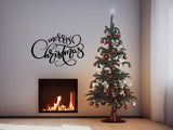Merry Christmas cursive vinyl wall lettering displayed in a seasonal interior.