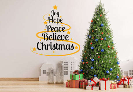 Joy Hope Peace Believe Christmas wall decal, layout 1 shown in a room setting.