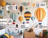 Children’s room decorated with colorful balloon and cloud wall decals.