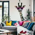 Playful Giraffe Wall Sticker with Pink Sunglasses displayed in a room setting.
